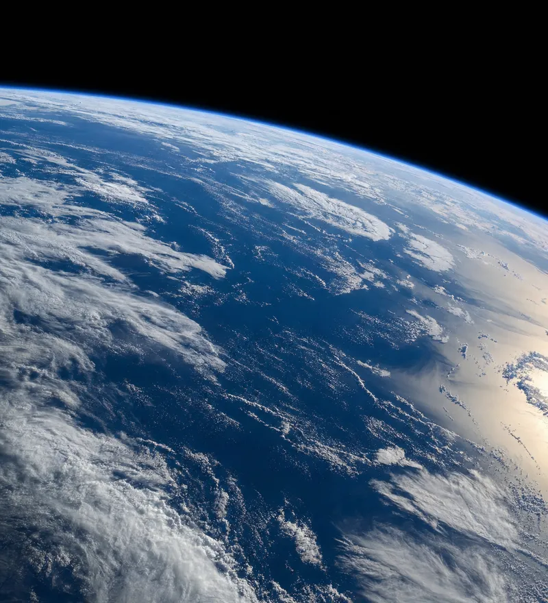 Earth observed from space — aerospace and defense-adjacent AI